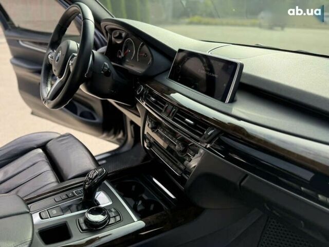 Черный БМВ Х5, объемом двигателя 3 л и пробегом 113 тыс. км за 24900 $, фото 17 на Automoto.ua