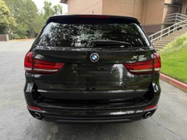 Черный БМВ Х5, объемом двигателя 3 л и пробегом 79 тыс. км за 7900 $, фото 3 на Automoto.ua