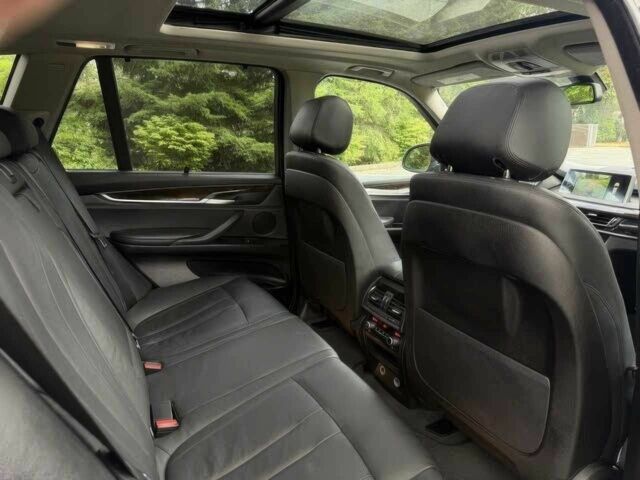 Черный БМВ Х5, объемом двигателя 3 л и пробегом 79 тыс. км за 7900 $, фото 12 на Automoto.ua