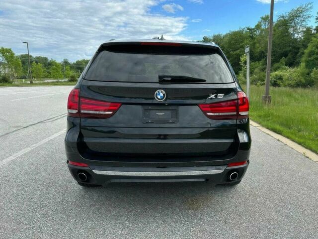 Черный БМВ Х5, объемом двигателя 3 л и пробегом 76 тыс. км за 11900 $, фото 4 на Automoto.ua