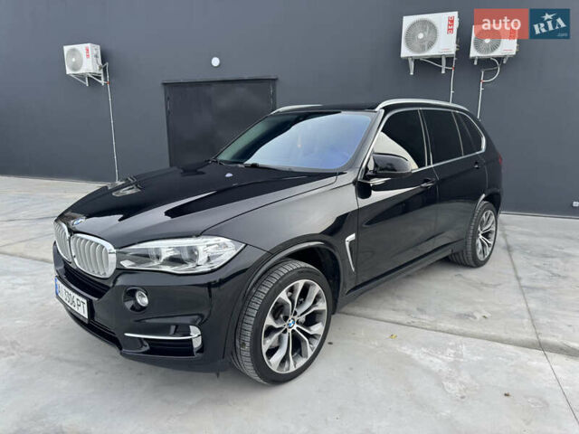 Черный БМВ Х5, объемом двигателя 3 л и пробегом 146 тыс. км за 25950 $, фото 2 на Automoto.ua