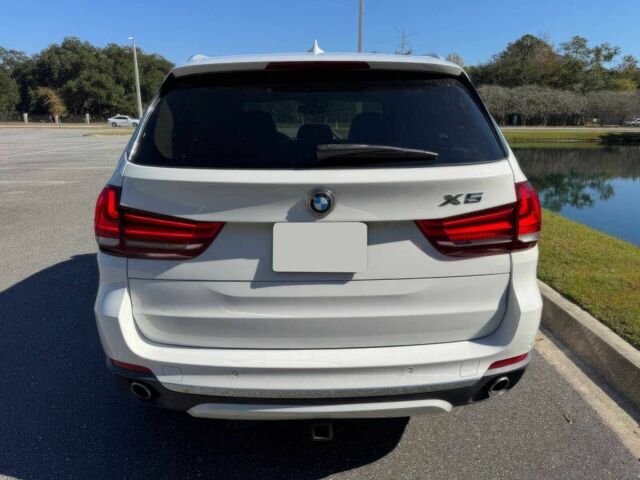 Чорний БМВ Х5, об'ємом двигуна 3 л та пробігом 73 тис. км за 14600 $, фото 6 на Automoto.ua