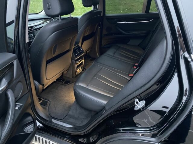 Черный БМВ Х5, объемом двигателя 3 л и пробегом 175 тыс. км за 26300 $, фото 13 на Automoto.ua