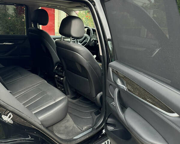 Черный БМВ Х5, объемом двигателя 3 л и пробегом 170 тыс. км за 32500 $, фото 16 на Automoto.ua