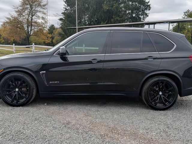 Черный БМВ Х5, объемом двигателя 3 л и пробегом 72 тыс. км за 16500 $, фото 3 на Automoto.ua