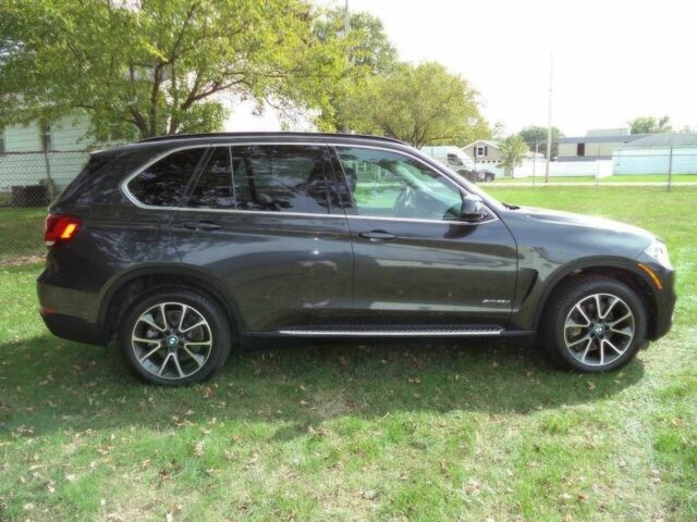 Черный БМВ Х5, объемом двигателя 3 л и пробегом 78 тыс. км за 19800 $, фото 3 на Automoto.ua