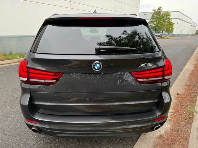 Черный БМВ Х5, объемом двигателя 3 л и пробегом 74 тыс. км за 5600 $, фото 5 на Automoto.ua