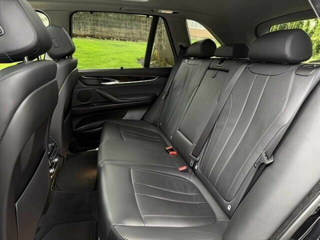 Чорний БМВ Х5, об'ємом двигуна 3 л та пробігом 75 тис. км за 25000 $, фото 14 на Automoto.ua