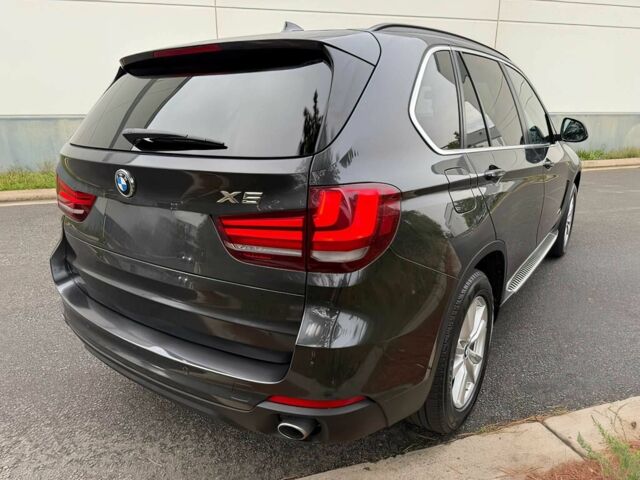 Черный БМВ Х5, объемом двигателя 3 л и пробегом 74 тыс. км за 5600 $, фото 4 на Automoto.ua