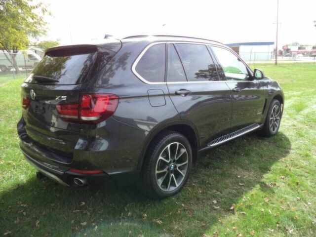 Черный БМВ Х5, объемом двигателя 3 л и пробегом 73 тыс. км за 12000 $, фото 7 на Automoto.ua