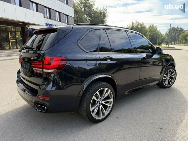 Черный БМВ Х5, объемом двигателя 3 л и пробегом 113 тыс. км за 24900 $, фото 3 на Automoto.ua
