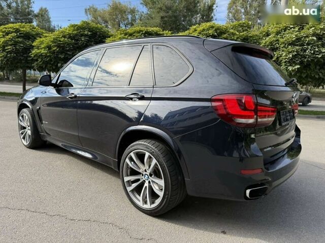Черный БМВ Х5, объемом двигателя 3 л и пробегом 113 тыс. км за 24900 $, фото 4 на Automoto.ua