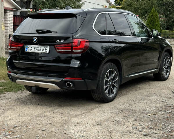 Черный БМВ Х5, объемом двигателя 3 л и пробегом 170 тыс. км за 32500 $, фото 5 на Automoto.ua