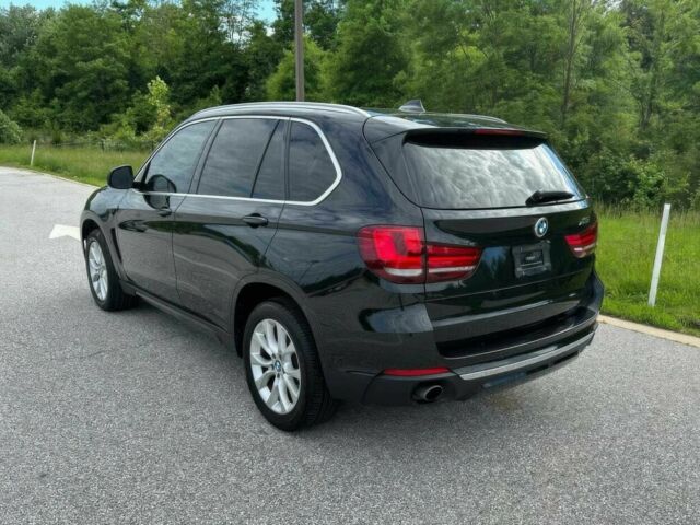 Черный БМВ Х5, объемом двигателя 3 л и пробегом 76 тыс. км за 11900 $, фото 3 на Automoto.ua