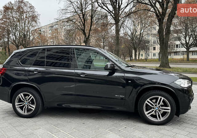 Чорний БМВ Х5, об'ємом двигуна 3 л та пробігом 144 тис. км за 32000 $, фото 7 на Automoto.ua
