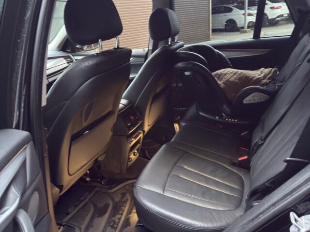 Черный БМВ Х5, объемом двигателя 3 л и пробегом 178 тыс. км за 20200 $, фото 13 на Automoto.ua