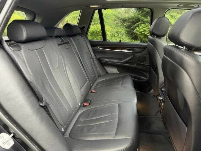 Чорний БМВ Х5, об'ємом двигуна 3 л та пробігом 77 тис. км за 11200 $, фото 9 на Automoto.ua