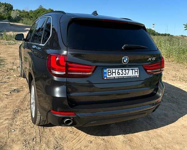 Черный БМВ Х5, объемом двигателя 2.98 л и пробегом 134 тыс. км за 28000 $, фото 5 на Automoto.ua