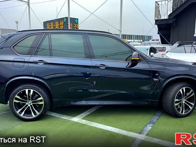 Чорний БМВ Х5, об'ємом двигуна 3 л та пробігом 200 тис. км за 29450 $, фото 4 на Automoto.ua