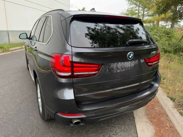 Черный БМВ Х5, объемом двигателя 3 л и пробегом 74 тыс. км за 5600 $, фото 6 на Automoto.ua