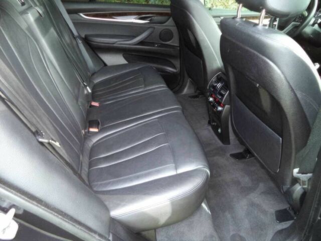 Черный БМВ Х5, объемом двигателя 3 л и пробегом 78 тыс. км за 19800 $, фото 11 на Automoto.ua