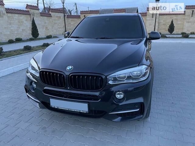 Черный БМВ Х5, объемом двигателя 3 л и пробегом 189 тыс. км за 43000 $, фото 3 на Automoto.ua