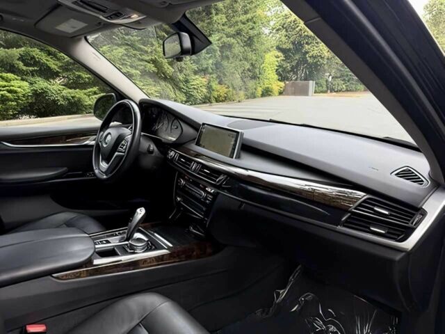 Чорний БМВ Х5, об'ємом двигуна 3 л та пробігом 75 тис. км за 25000 $, фото 13 на Automoto.ua