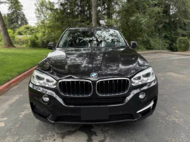Чорний БМВ Х5, об'ємом двигуна 3 л та пробігом 77 тис. км за 11200 $, фото 1 на Automoto.ua