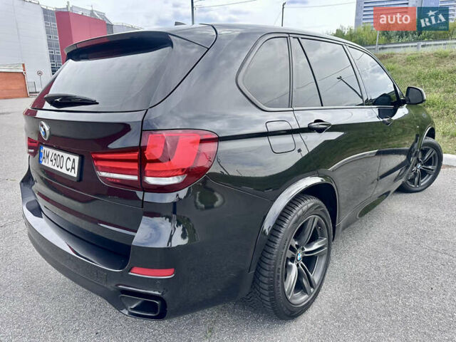 Черный БМВ Х5, объемом двигателя 3 л и пробегом 240 тыс. км за 33700 $, фото 4 на Automoto.ua