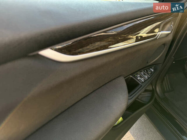 Черный БМВ Х5, объемом двигателя 2 л и пробегом 120 тыс. км за 27900 $, фото 12 на Automoto.ua