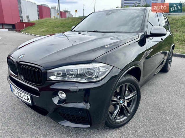 Черный БМВ Х5, объемом двигателя 3 л и пробегом 240 тыс. км за 33700 $, фото 1 на Automoto.ua