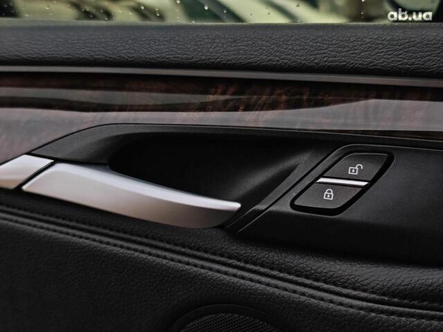 Чорний БМВ Х5, об'ємом двигуна 3 л та пробігом 298 тис. км за 19990 $, фото 23 на Automoto.ua