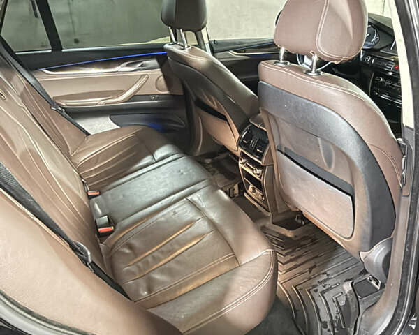 Черный БМВ Х5, объемом двигателя 2 л и пробегом 212 тыс. км за 19900 $, фото 74 на Automoto.ua