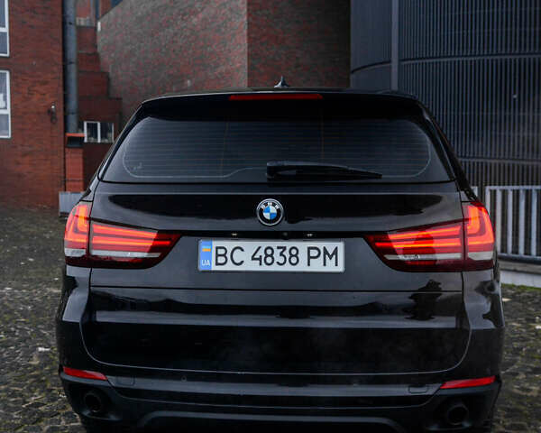 Черный БМВ Х5, объемом двигателя 2 л и пробегом 167 тыс. км за 23000 $, фото 1 на Automoto.ua