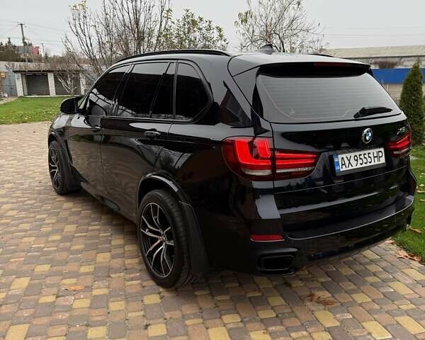 Черный БМВ Х5, объемом двигателя 3 л и пробегом 225 тыс. км за 36500 $, фото 4 на Automoto.ua