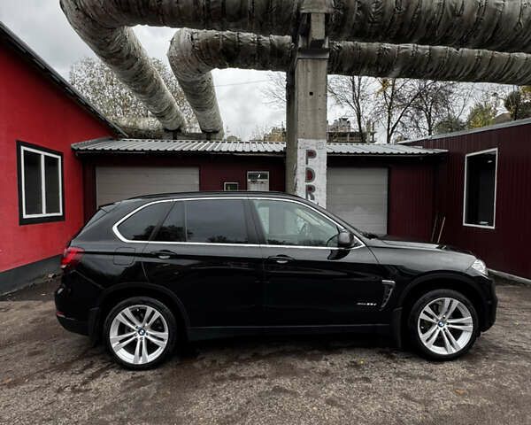 Чорний БМВ Х5, об'ємом двигуна 2 л та пробігом 147 тис. км за 27500 $, фото 2 на Automoto.ua