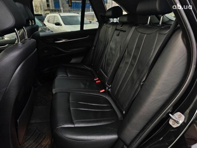 Чорний БМВ Х5, об'ємом двигуна 3 л та пробігом 298 тис. км за 19990 $, фото 27 на Automoto.ua