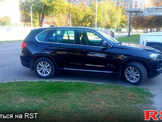 Черный БМВ Х5, объемом двигателя 2 л и пробегом 77 тыс. км за 20500 $, фото 1 на Automoto.ua