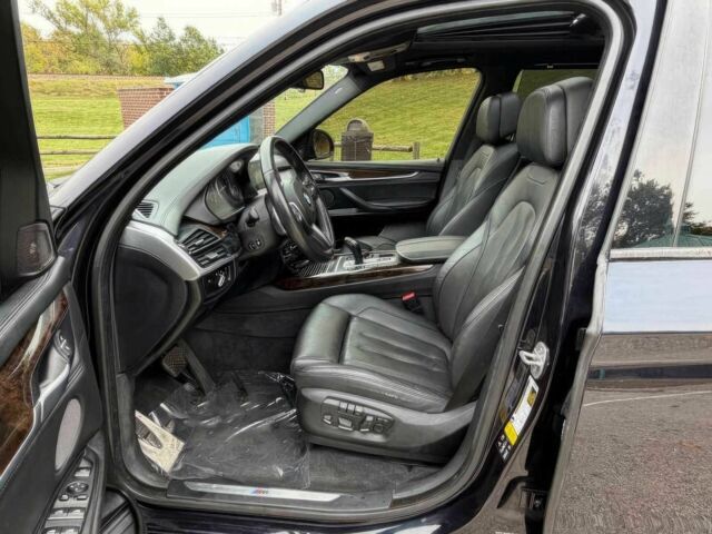 Черный БМВ Х5, объемом двигателя 4.4 л и пробегом 73 тыс. км за 18000 $, фото 8 на Automoto.ua