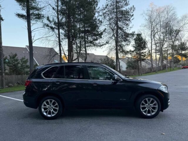 Черный БМВ Х5, объемом двигателя 3 л и пробегом 75 тыс. км за 11900 $, фото 6 на Automoto.ua