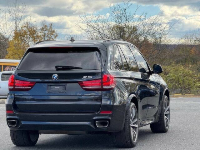 Чорний БМВ Х5, об'ємом двигуна 3 л та пробігом 71 тис. км за 15000 $, фото 4 на Automoto.ua