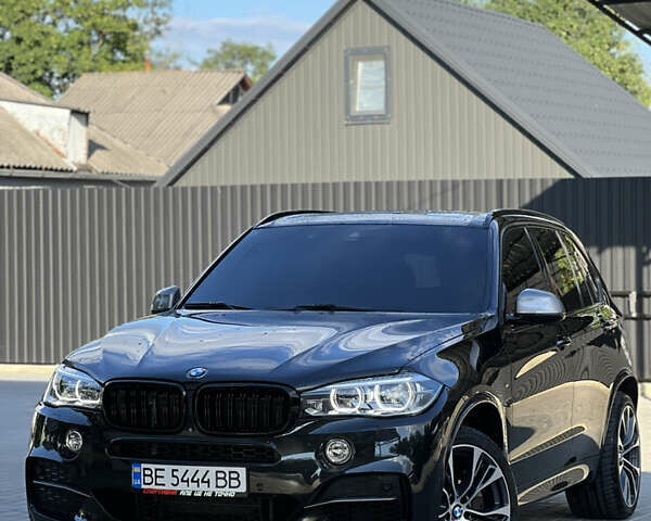 Черный БМВ Х5, объемом двигателя 3 л и пробегом 225 тыс. км за 38888 $, фото 1 на Automoto.ua