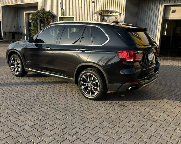 Черный БМВ Х5, объемом двигателя 2 л и пробегом 258 тыс. км за 25500 $, фото 14 на Automoto.ua