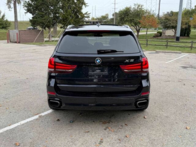 Черный БМВ Х5, объемом двигателя 4.4 л и пробегом 73 тыс. км за 18000 $, фото 6 на Automoto.ua