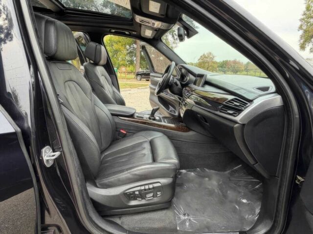 Черный БМВ Х5, объемом двигателя 4.4 л и пробегом 73 тыс. км за 18000 $, фото 9 на Automoto.ua