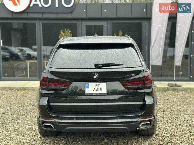 Чорний БМВ Х5, об'ємом двигуна 2 л та пробігом 189 тис. км за 24500 $, фото 3 на Automoto.ua