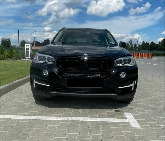 Черный БМВ Х5, объемом двигателя 2 л и пробегом 112 тыс. км за 32950 $, фото 1 на Automoto.ua