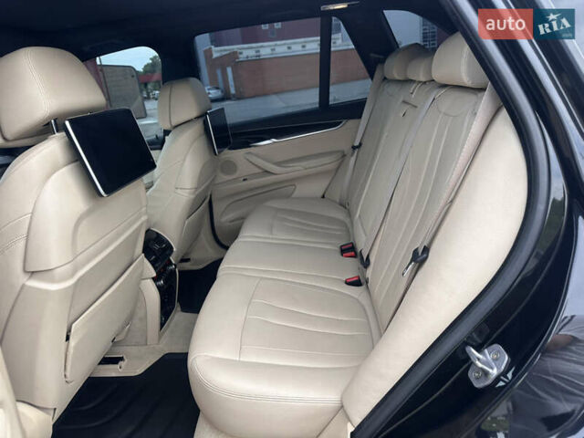 Черный БМВ Х5, объемом двигателя 3 л и пробегом 240 тыс. км за 33700 $, фото 20 на Automoto.ua