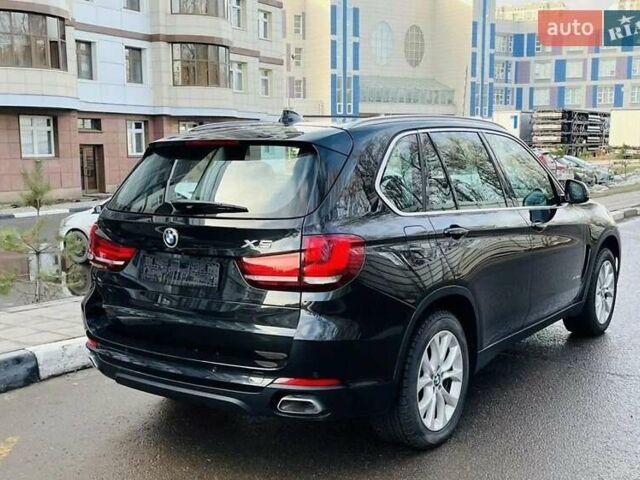 Черный БМВ Х5, объемом двигателя 3 л и пробегом 55 тыс. км за 28900 $, фото 5 на Automoto.ua