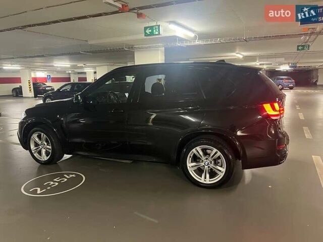 Черный БМВ Х5, объемом двигателя 2 л и пробегом 150 тыс. км за 28000 $, фото 4 на Automoto.ua